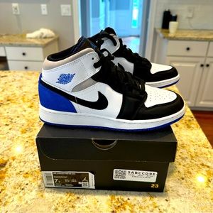 Air Jordan mid black, white and royal blue- big boy 7/women’s size 7.5-8
